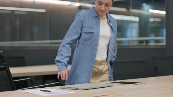 Indian Woman Coming and Opening Laptop in Office alt