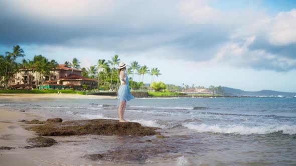 Attractive Young Lady on Ocean Beach She Turns Around Happy Female Tourist alt
