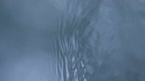 Super Slow Motion Abstract Shot of Deep Blue Water Waves From Top Shot at 1000Fps alt