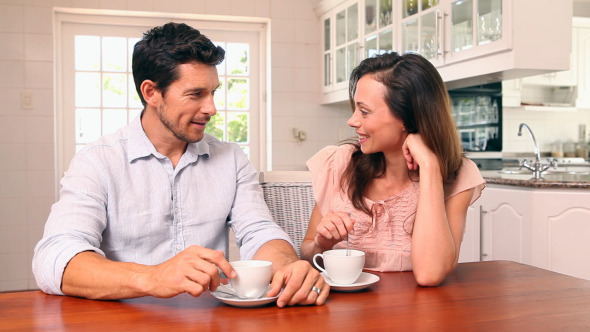 Happy Couple Drinking Coffee Together 1