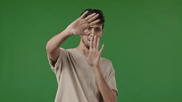 Emotional Young Hindu Man Scared Businessman Freelancer Arabian Guy Cover Face Waving Palms Fearful alt
