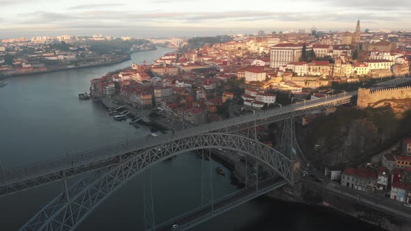 Aerial view of the city of Porto (Portugal) crossing the river (Douro) and Dom Luis I bridge alt
