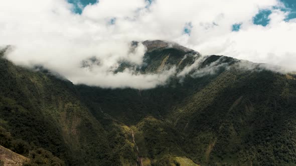 Cloud Canopy Over Tungurahua Volcano Near Town Of Baños In Ecuador. Aerial Shot alt