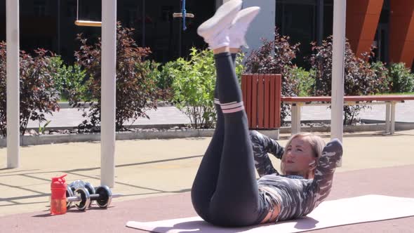 Woman's outdoor workout in summer