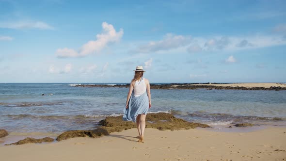 Inspirational Concept Footage Woman Blue Waving Dress Walking By Island Beach alt