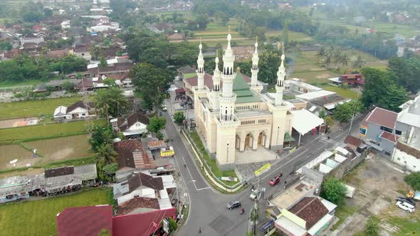 Suciati Saliman Mosque, Sleman city in Indonesia. Aerial circling alt
