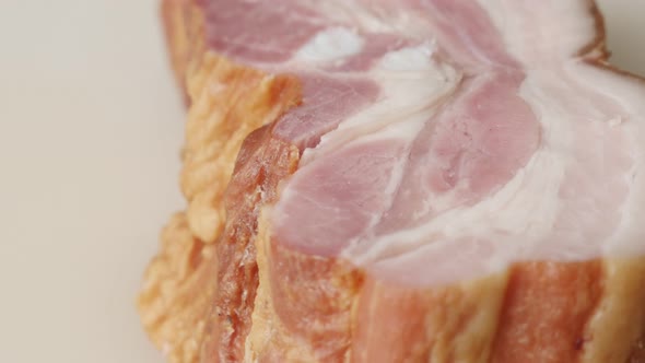 Cured bacon tasty unhelathy food slow tilt 4K 2160p 30fps UltraHD footage - Fat red and white pork m alt