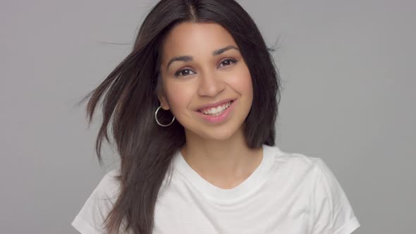 Young Mixed Race Woman in Studio in Casual Look