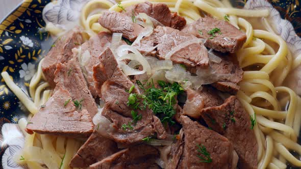 Etnic Kazakh Food  Beshbarmak Meat with Noodles alt