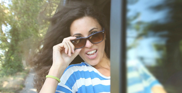 Girl Dancing Out Window Car alt