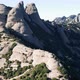 Drone flight over the famous mountain range of Catalonia; sunny winter - VideoHive Item for Sale