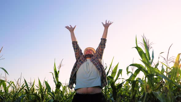 Young Man Farmer Agronomy Joyfully Jump Laugh Shout Something Raise Hands Up Looking Up Bottom View alt