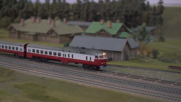 Mini Train Station Modelling. Model of Railway Station With Moving Train. Model Electric Locomotive alt