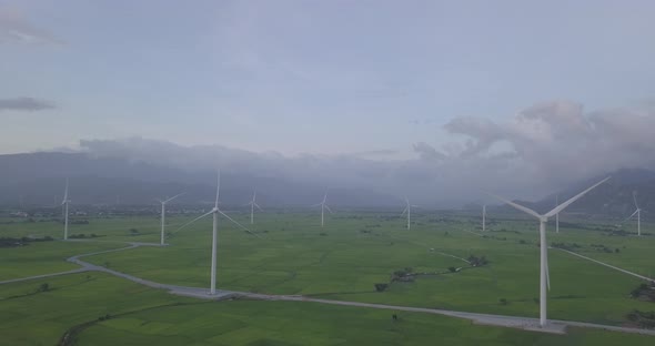  Wind turbine or windmill in a greenfield - Energy Production with clean and Renewable Energy
