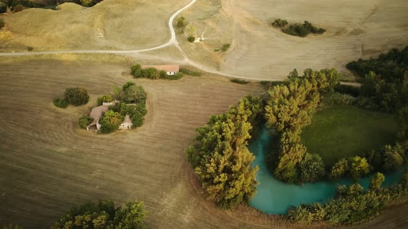 View From a Bird's Eye View of a House in the Middle of a Field alt