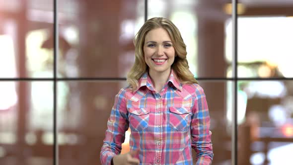 Portrait of Young Attractive Girl with Call Me Gesture alt