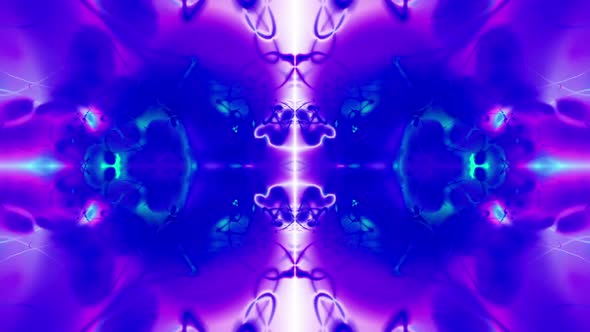 Kaleidoscopic effect of green, yellow, black, red, and pink. alt