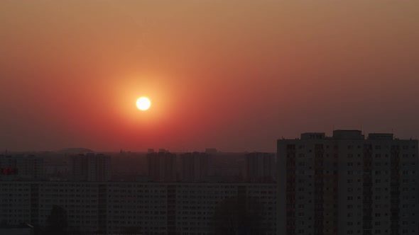 The Sun Hides Behind the Buildings 