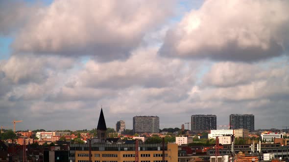 Timelapse of Clouds Passing Over City alt