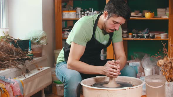 Pottery - the Master Is Wetting the Clay for Better Glide alt