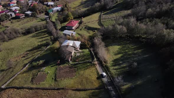 Drone is Flying Over the Small Village in the Mountains of Georgia Svaneti alt