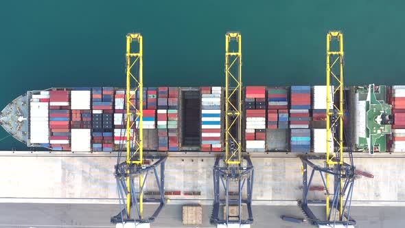 Aerial view from drone of Container , container ship in export and import business and logistics. alt