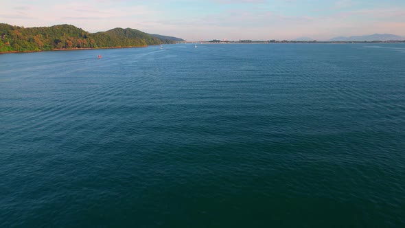 4K Aerial view of drone move on beautiful sea. Flight over ocean, open sea. alt