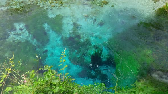 Beautiful Turquoise Spring Blue Eye or Syri i Kalter Near Muzine Town in Albania alt