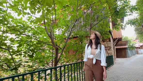 Tourist Woman Walking The Streets alt