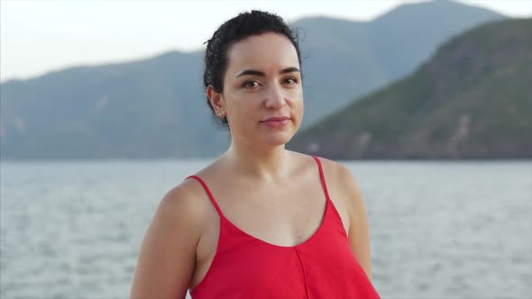 Portrait of a Mixed Race Student Young Woman the Background of the Nature of Beautiful Mountains and alt