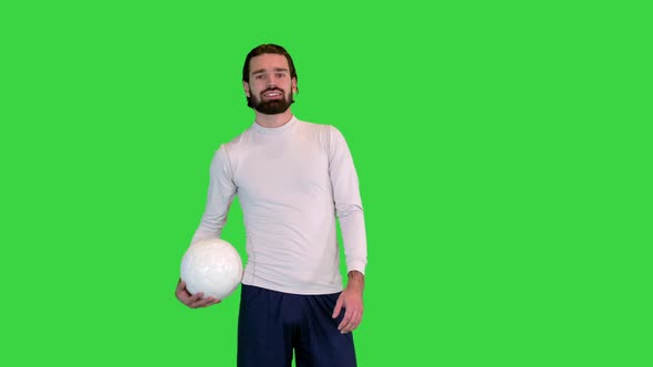 Young Soccer Player with a Ball on a Green Screen Chroma Key