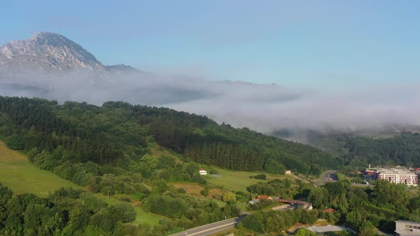 Aerial View of the Mountain and Morning Fog in the Suburb of Durango Basque Country alt