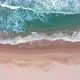 Aerial view of waves crash to shore - VideoHive Item for Sale