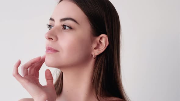 Beauty Portrait Skin Care Woman Touching Soft Face alt