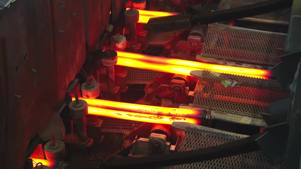 The Hot Metal is Pulled Through the Mold alt