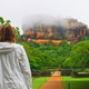 Following a Tourist Walking Towards Sigiriya Rock Temple in Sri Lanka During the Rainy Season - VideoHive Item for Sale