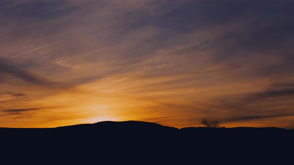 Brilliant Orange and Blue Sunrise Timelapse Zoom in