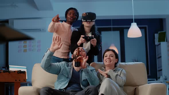 Diverse Group of People Playing Video Games with Vr Glasses alt