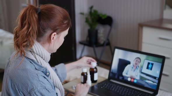 Medicine and Health, Female Patient Consults About Treatment Status with Doctor Online Shows alt