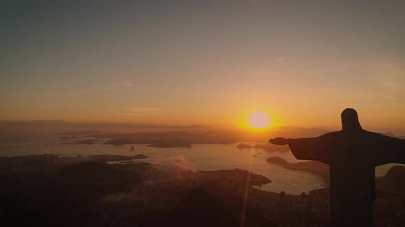 Over the arms of Christ the Redeemer, in Rio - Brazil