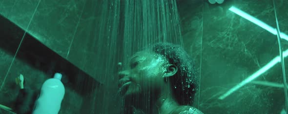 Black Woman Taking Shower in Bathroom alt