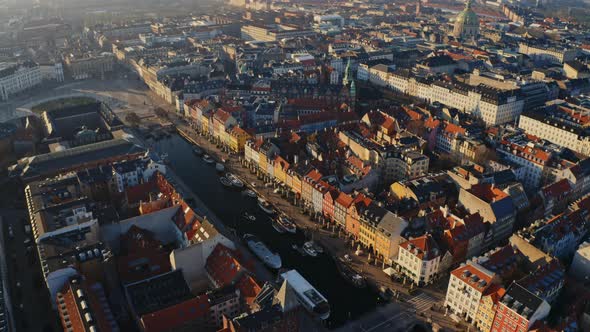 Pier in the Middle of the City Surrounded By Tall Architecure in Denmark alt