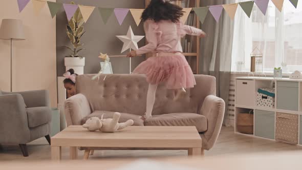 Female Kids Running Around Room alt