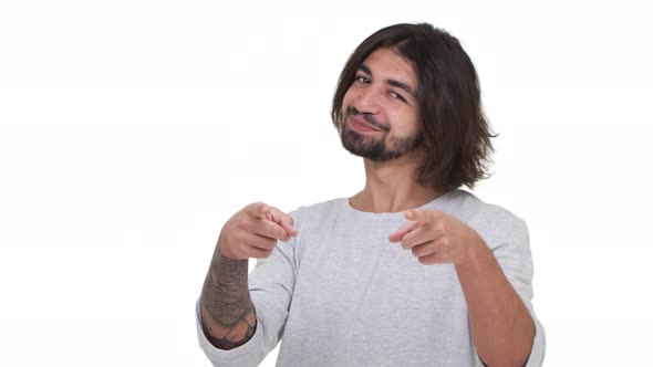 Longhaired Guy Doing Rap Gestures Isolated Over White Background alt
