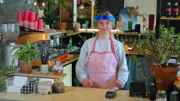 Female Barista with Face Shield for Prevention Coronavirus Spread alt