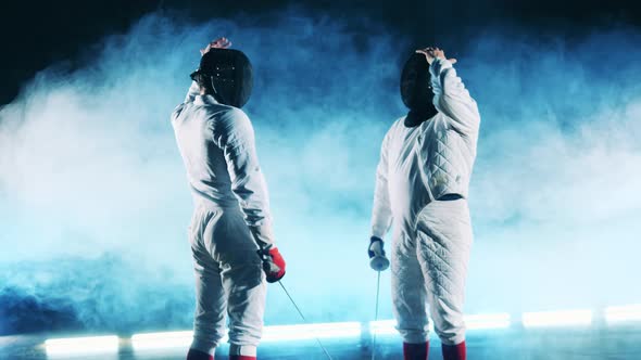 Two Fencers are Taking a Position Before Starting the Competition alt