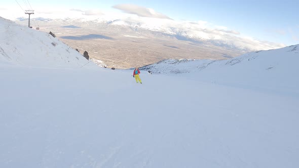 Woman Is Skiing at a Ski Resort