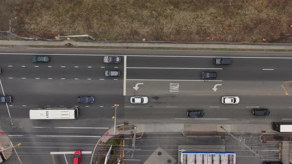 Top Down Aerial of Cars Drive at Cross Road