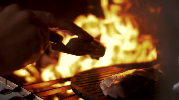 Fillet of ocean perch fried on charcoal grill