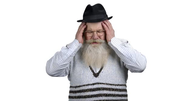 Depressed Old Man Holding Hands on Head alt